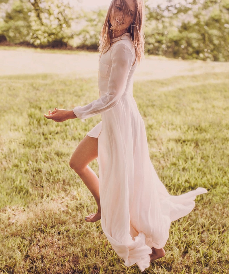Karmen Pedaru is all smiles in breezy Carolina Herrera maxi dress