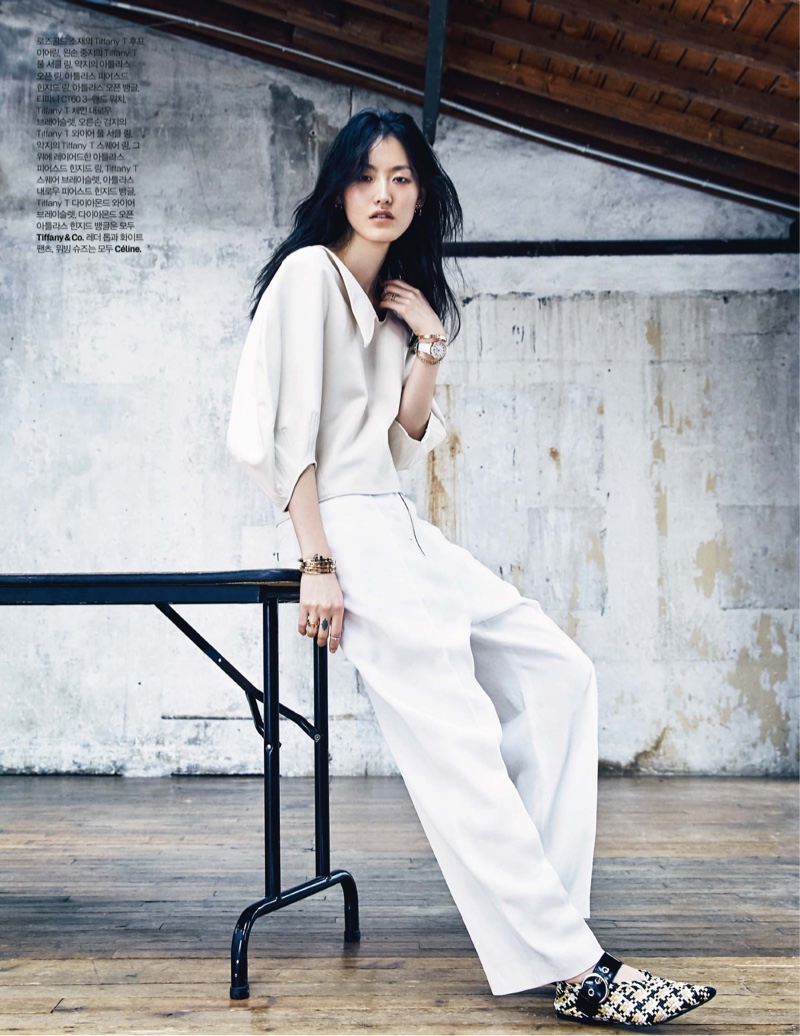 Hye Sung Lee models Celine top, trousers and shoes with Tiffany & Co. jewelry