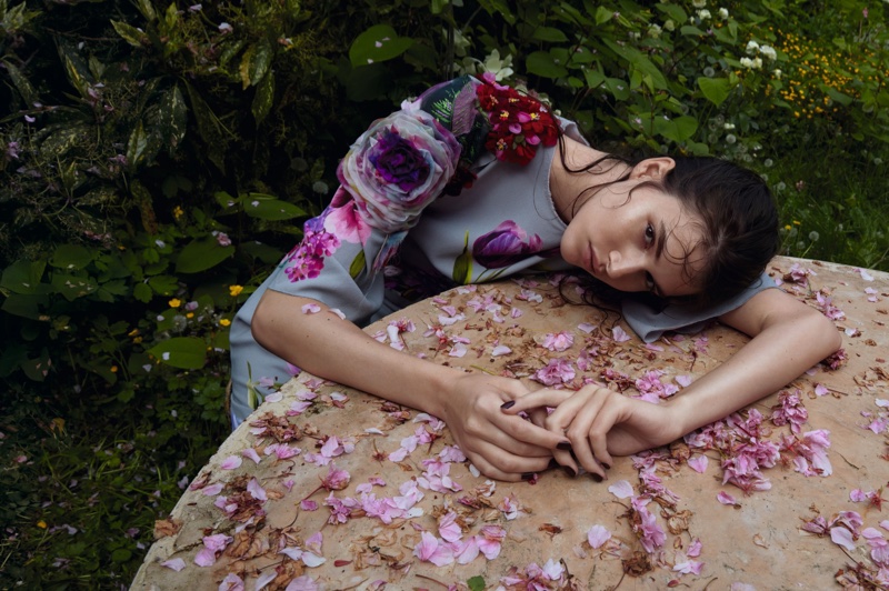 Vanessa Moody poses in floral applique dress by Dolce & Gabbana
