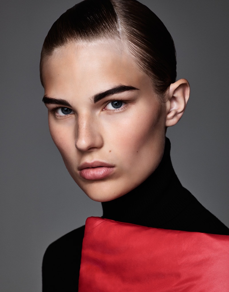 Photographed by Jason Kim, the model wears bold makeup looks