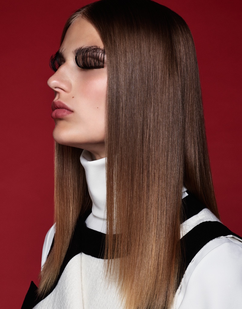 With a sleek and straight hairstyle with feathery eyelashes