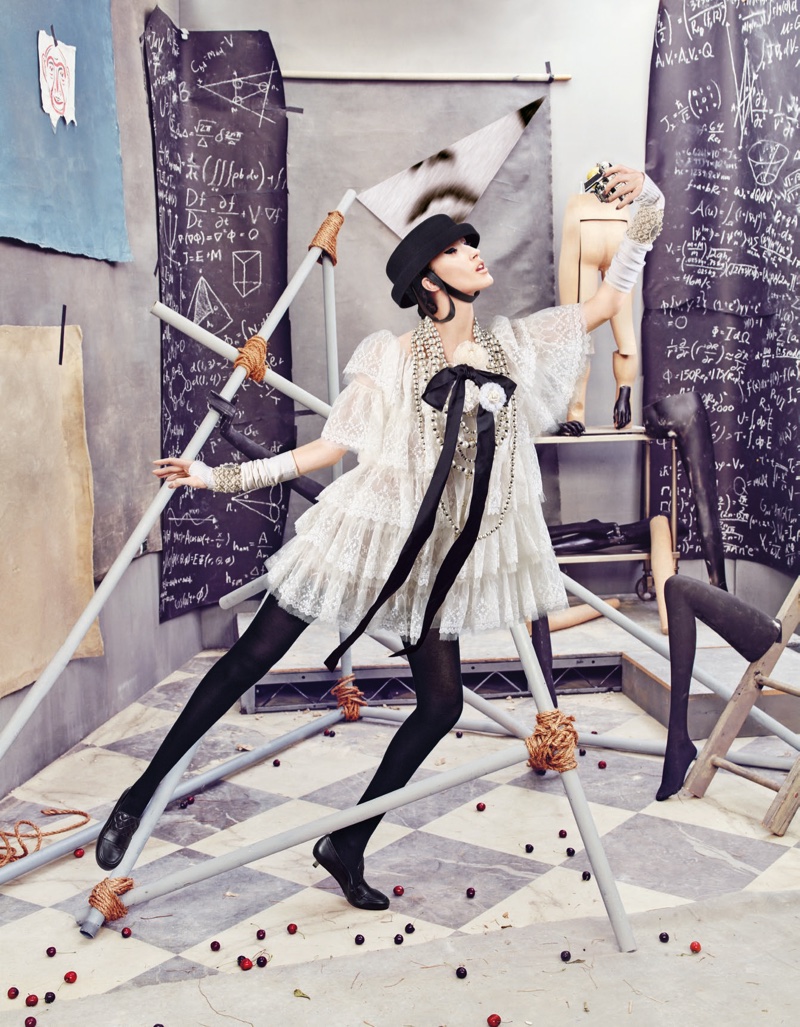 Anna Cleveland models Chanel silk dress and moccasins