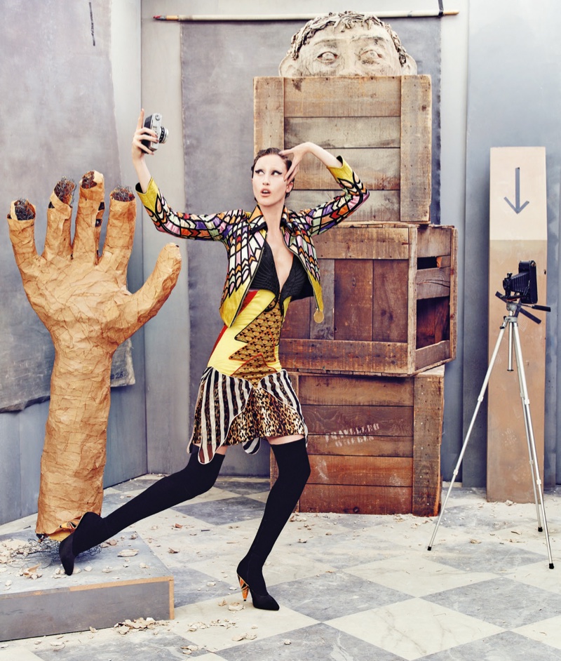 Anna Cleveland models Givenchy cropped jacket, dress and boots in Neiman Marcus' Art of Fashion campaign