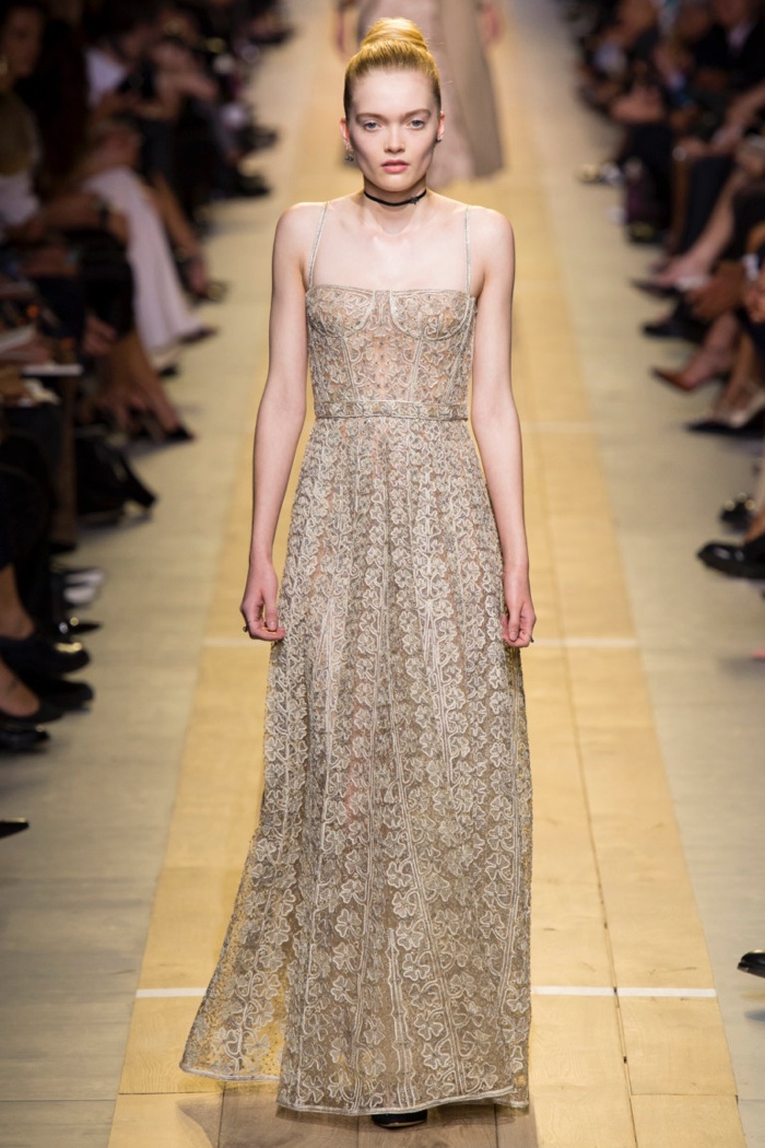 Dior Spring 2017: Model walks the runway in embroidered gown with bustier detail