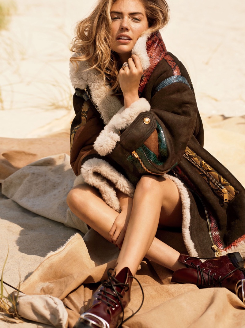 Kate Upton covers up in Burberry coat with Alexander Wang combat boots