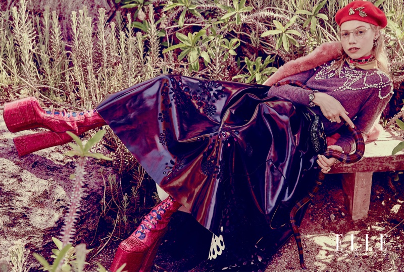 Laura Schellenberg models Dries Van Noten embellished sweater and shirt with J. Crew fur coat, and Marc Jacobs skirt and leather boots