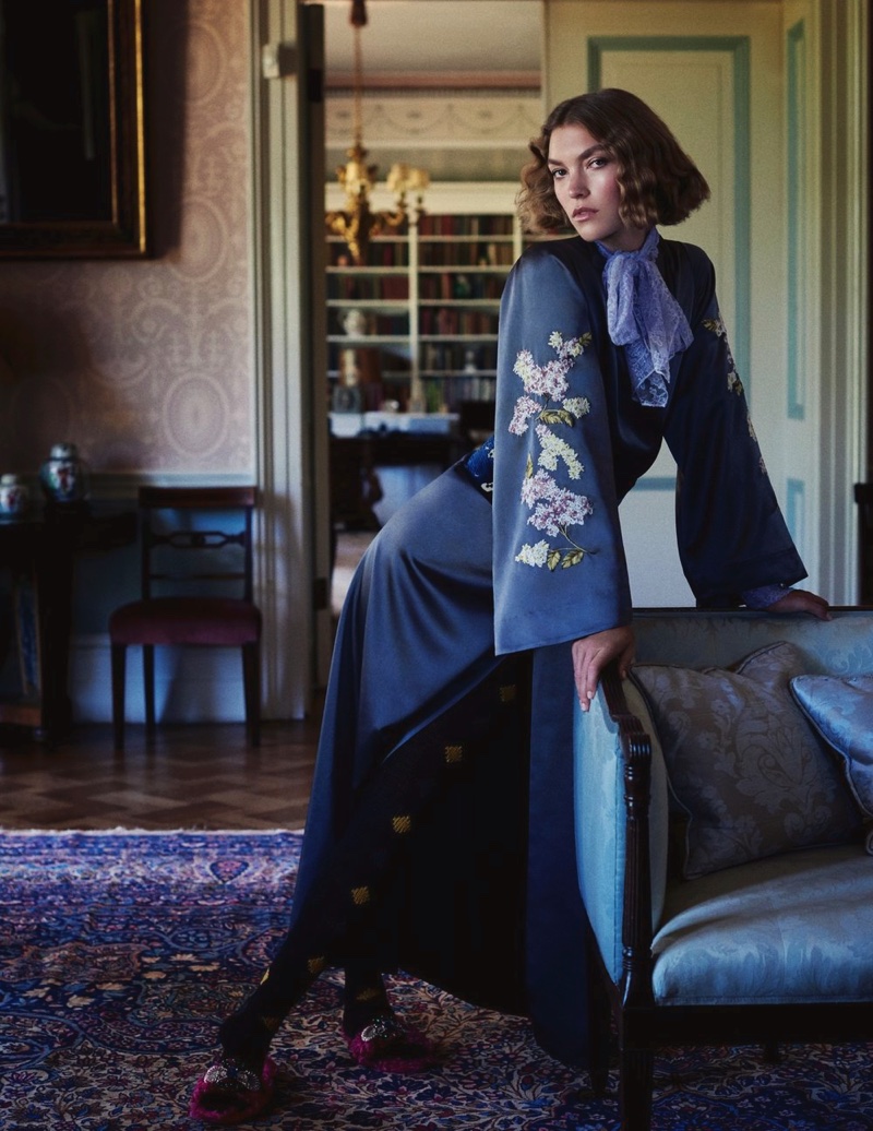 Arizona Muse covers up in bell sleeve dress