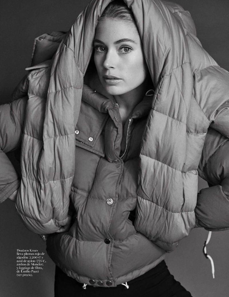 The model layers up in Moncler down jackets with Emilio Pucci leggings