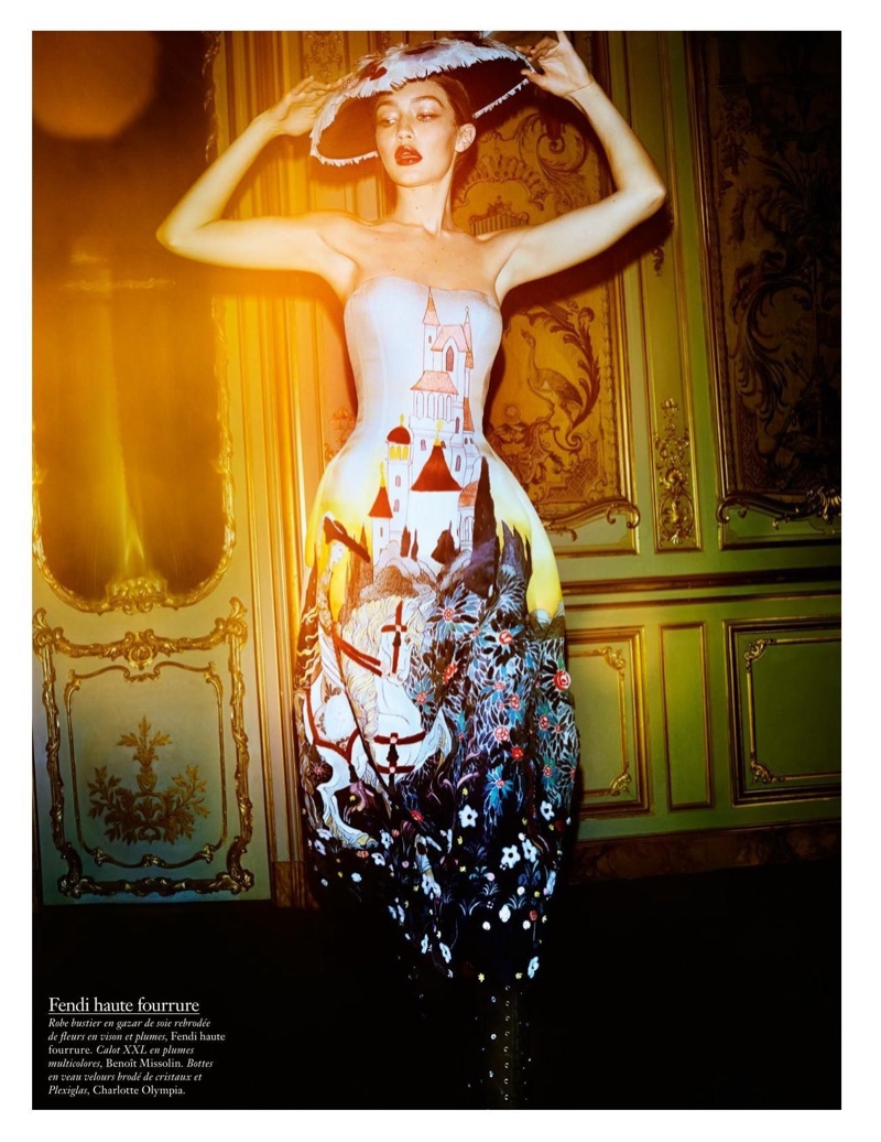 Wearing a dress with a painterly scene, Gigi Hadid models Fendi Haute Fourrure
