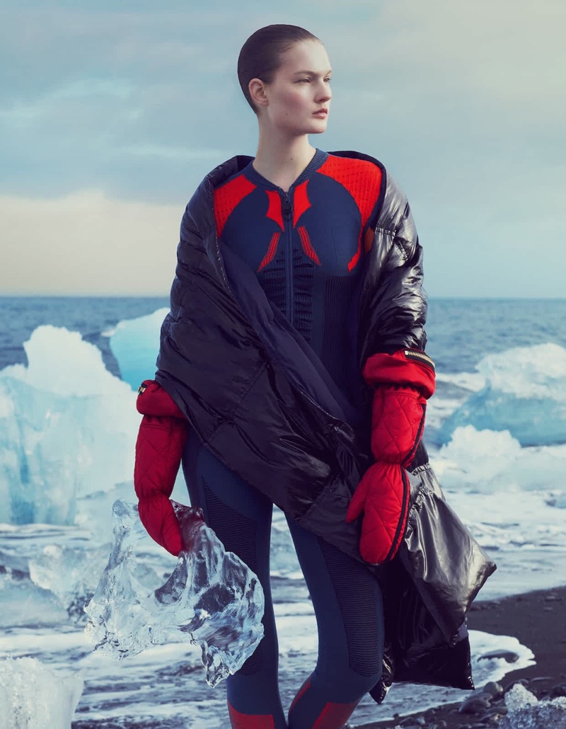 Looking to the distance, Kirsi Pyrhonen poses in DKNY scard, Louis Vuitton jumpsuit and Astrid Andersen gloves
