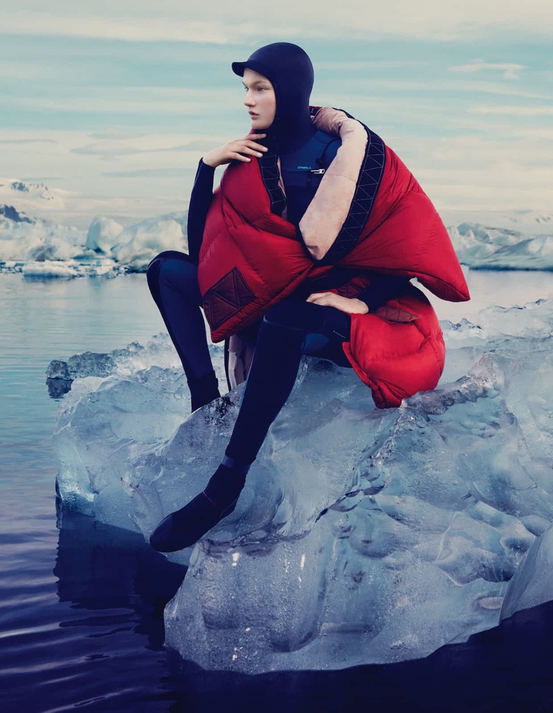 Sitting on a glacier, Kirsi Pyrhonen models Anne Sofie Madsen nylon coat