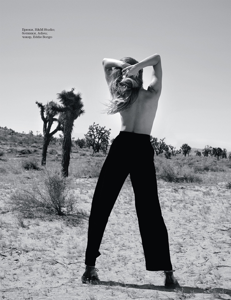 Posing topless, Maryna Linchuk models H&M Studio pants