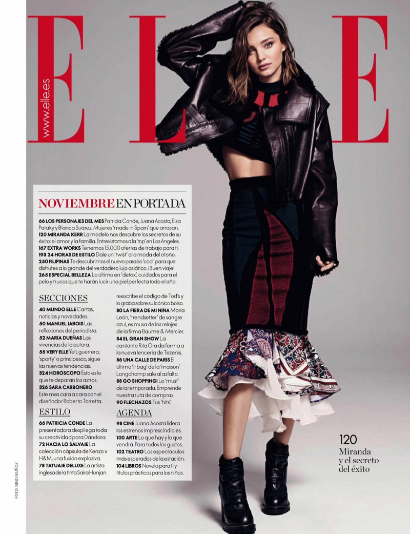 Miranda Kerr looks cool in Louis Vuitton leather jacket, cropped top and ruffled skirt