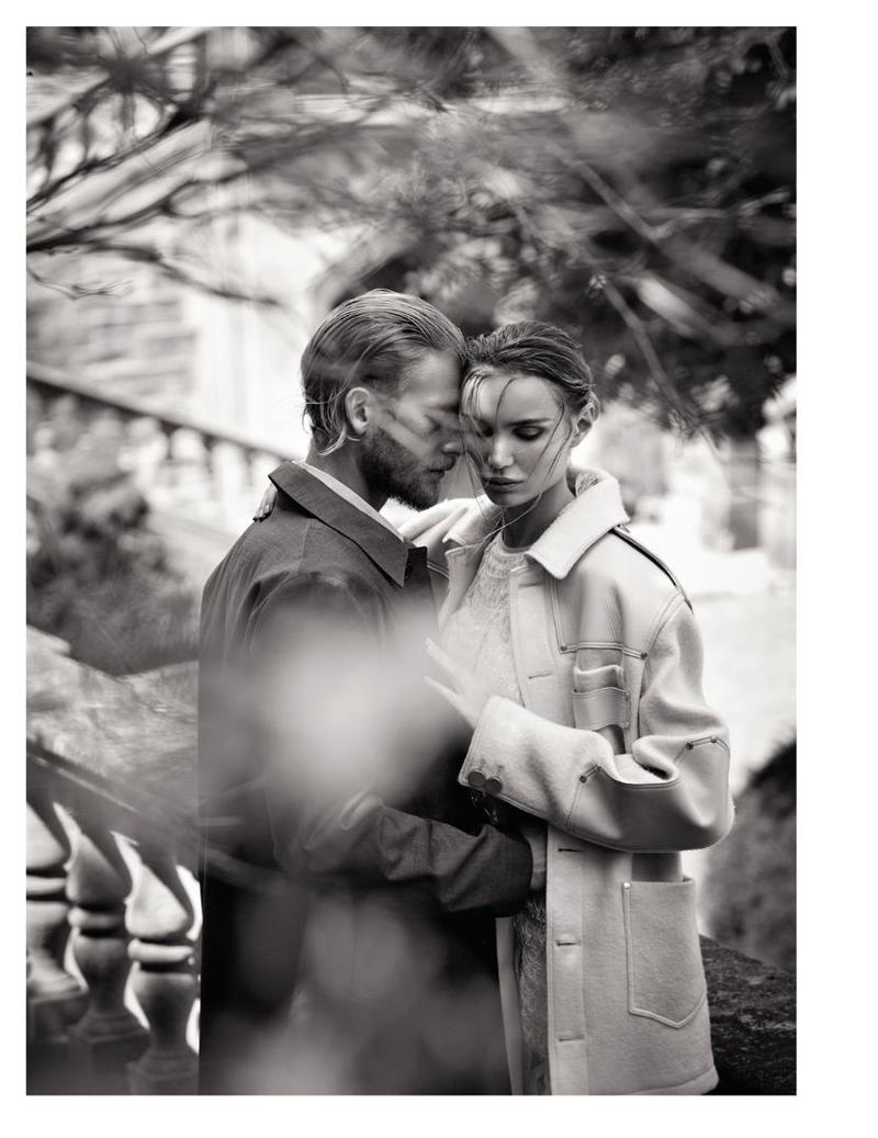 Photographed in black and white, the couple shares a romantic moment