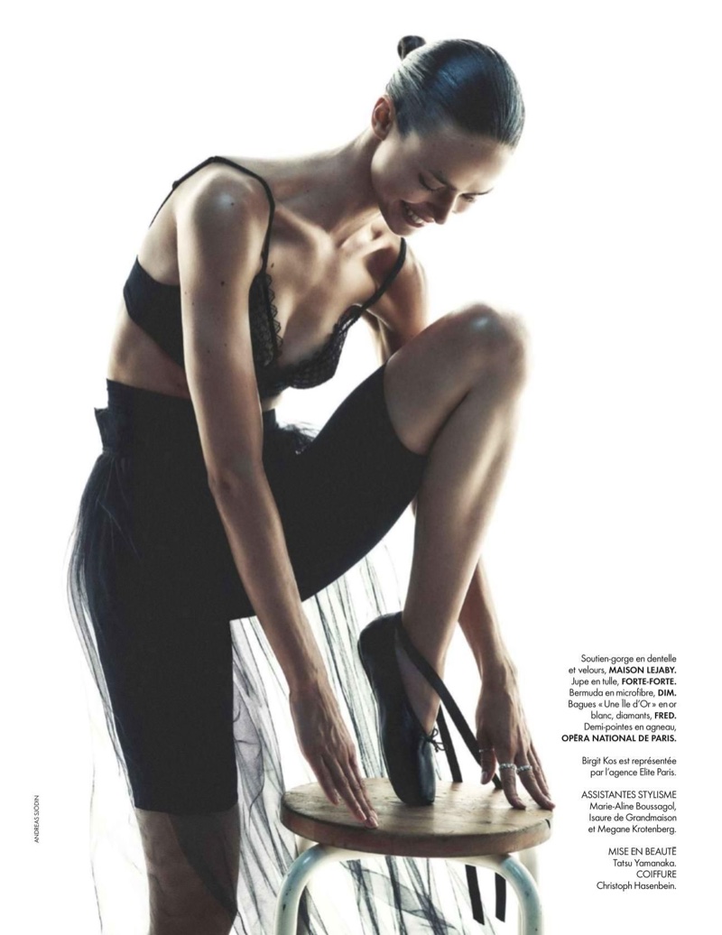 Clad in all black, the model wears Maison Lejaby lace and velvet bra, Forte-Forte tulle skirt, Dim Bermuda shorts and Opera National de Paris ballet shoes