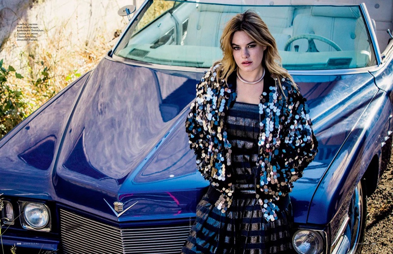 Serving cool, Camille Rowe poses in sequined jacket and dress