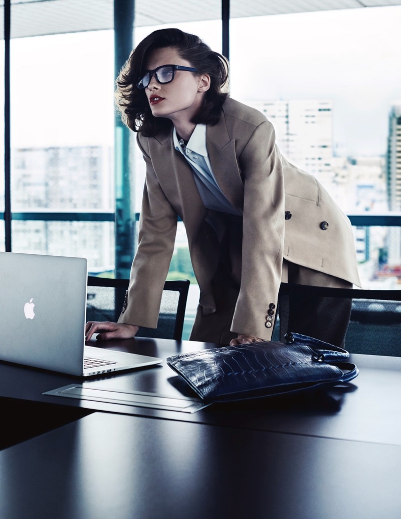 Elena Melnik wears Celine blazer, shirt and pants