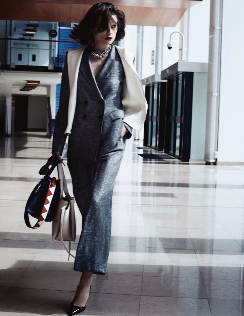 Suiting up, Elena Melnik takes a stroll in Max Mara jacket and pants