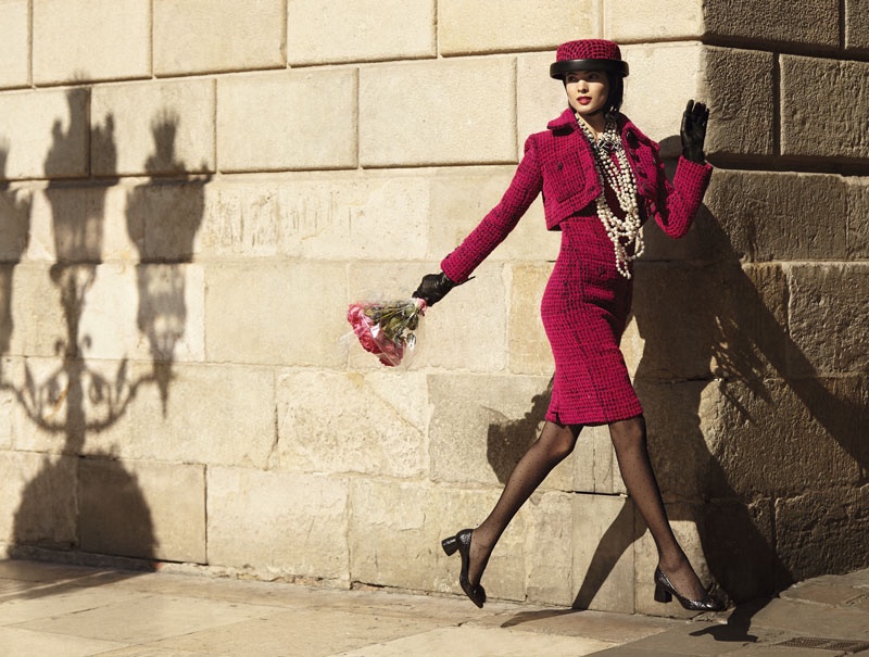 Hanaa Ben Abdesslem wears Chanel jacket and high-waisted skirt