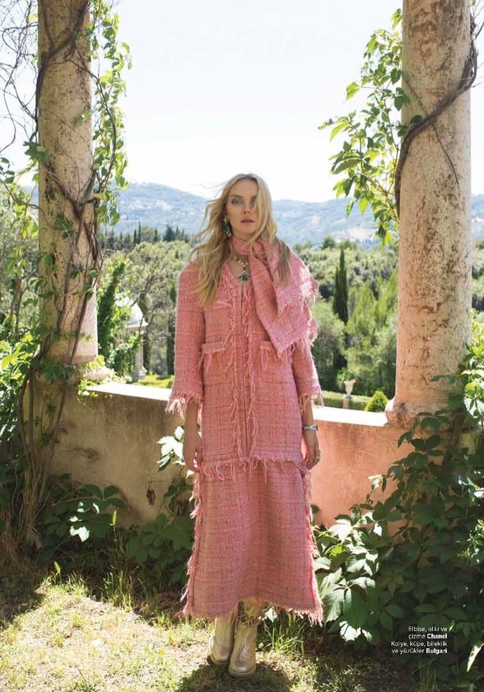 Heather Marks covers up in Chanel tweed and boots with Bulgari jewelry