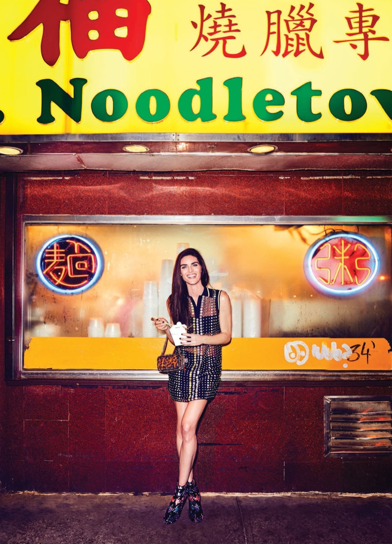 Model Hilary Rhoda flaunts her legs in Versace dress, Roger Vivier boots and Christian Louboutin clutch
