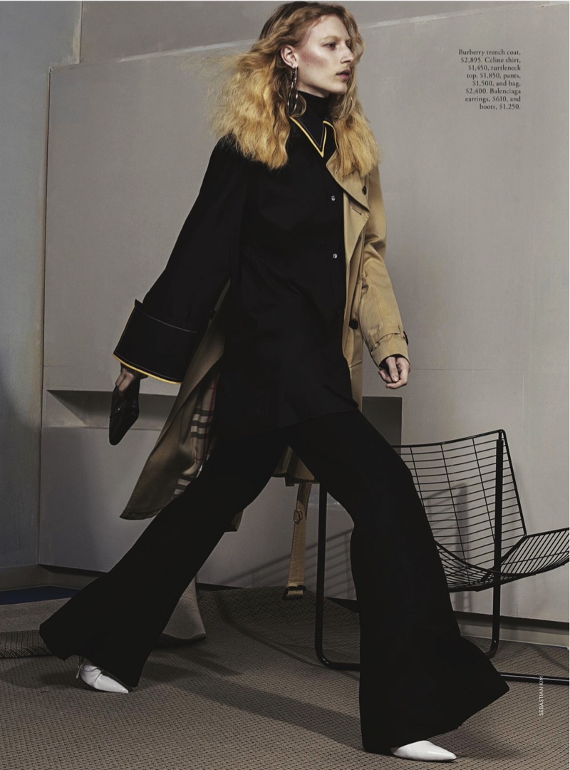 Hitting her stride, Julia Nobis wears Burberry trench coat, Celine shirt, turtleneck, top, pants and bag