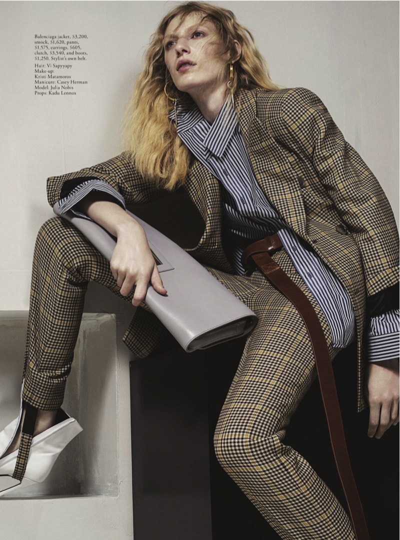 Embracing print, Julia Nobis wears Balenciaga jacket, smock, pants and clutch
