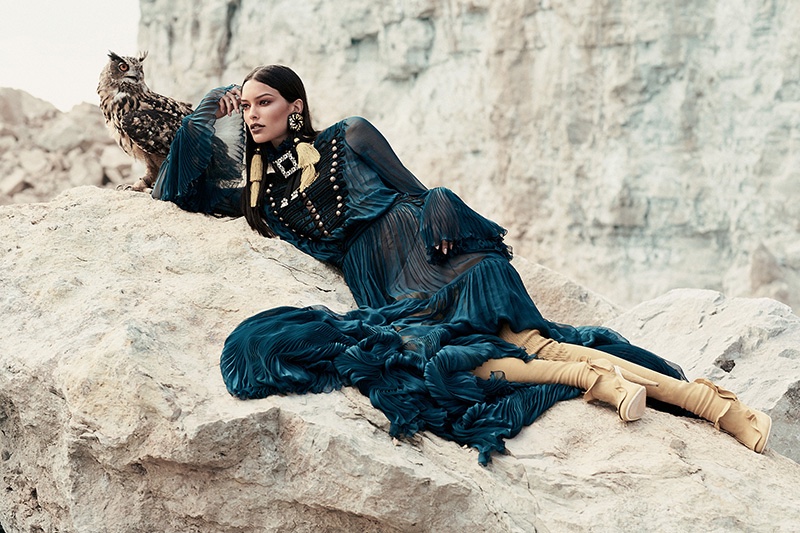 Embracing pleats, Lizzy Salt models Roberto Cavalli dress