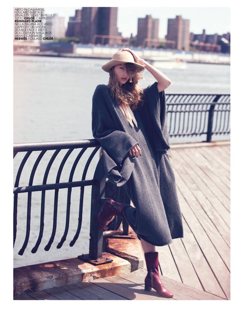 Susanne Knipper poses in Chloe cashmere dress and leather boots with Reinhard Plank hat