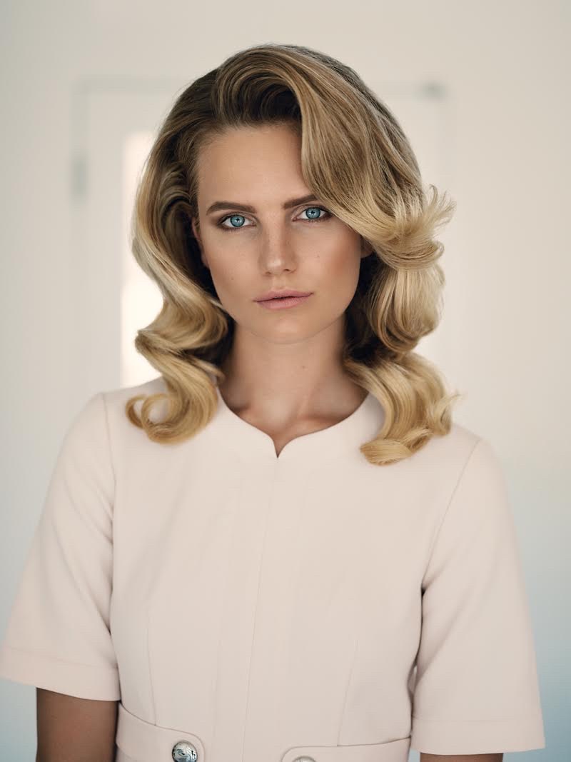 Photographed by Andrea D'Aquino, Anmari Botha looks retro chic in & Other Stories dress