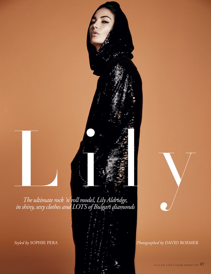 Photographed by David Roemer, Lily Aldridge poses in Veronique Branquihno hooded sequin dress