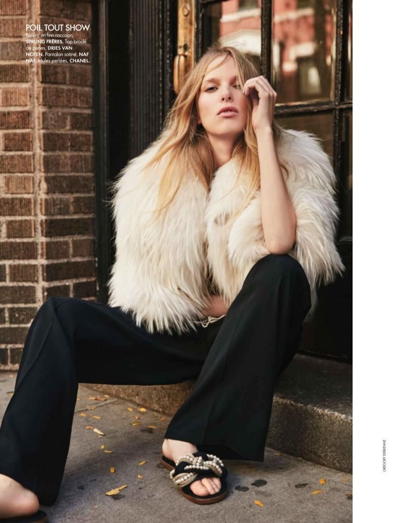 Lina Berg poses in Sprung Frères fur jacket, Dries van Noten top and Naf Naf pants wth Chanel sandals
