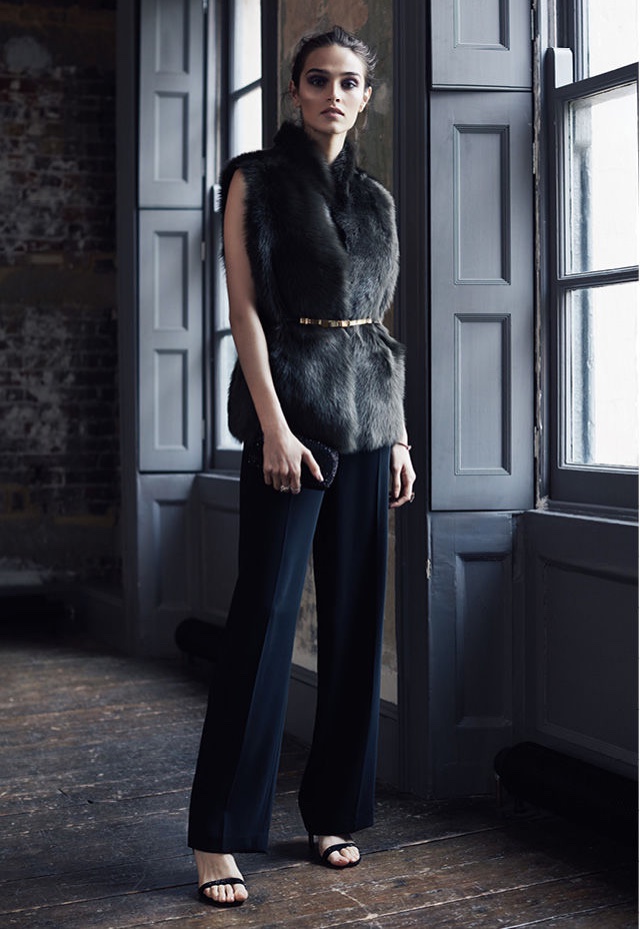 REISS Tessa Reversible Olive Shearling Vest, Natalie Lace-Top Jumpsuit, Jasper Slim Metal-Detail Belt, Malva Crystal Embellished Heels and Ancona Fully-Embellished Clutch Bag