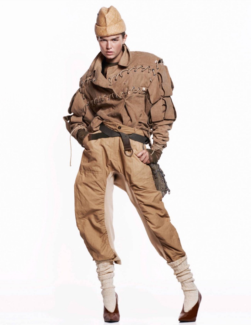 Model Anna Ewers poses in military inspired fashions for the editorial