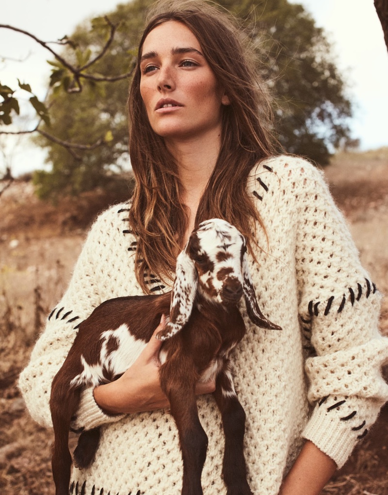 Posing with a goat, Josephine le Tutour wears Isabel Marant sweater