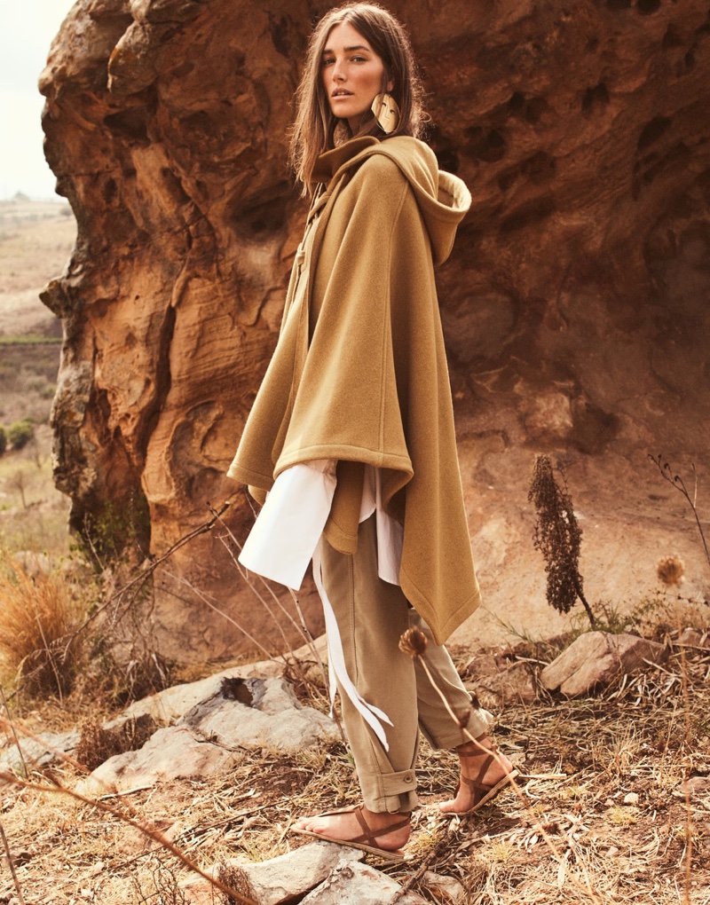 Josephine le Tutour models Chloe cape and pants with Georgia Alice shirt and Ancient Greek sandals