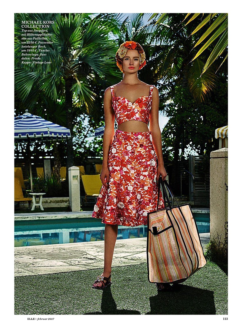 Maud Welzen looks retro glam in Michael Kors Collection floral appliqué top and skirt