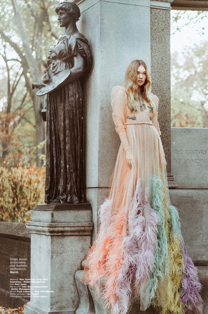 Puck Loomans strikes a pose in Gucci feather embroidered dress
