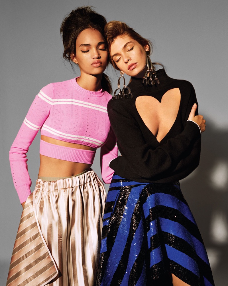 Ellen Rosa models Fendi cropped sweater, skirt and pants. Stella Maxwell wears Proenza Schouler turtleneck, wrap skirt and earrings.