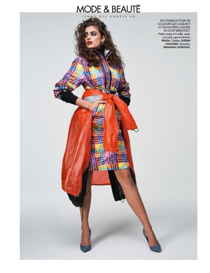 Embracing print, Taylor Hill models Prada parka, skirt, jacket and belt