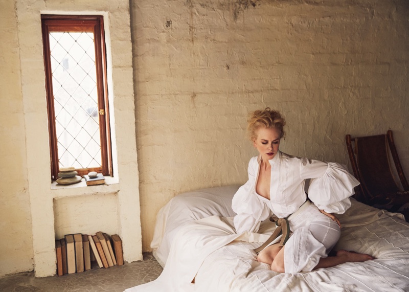 Posing in bed, Nicole Kidman wears Johanna Ortiz dress and belt