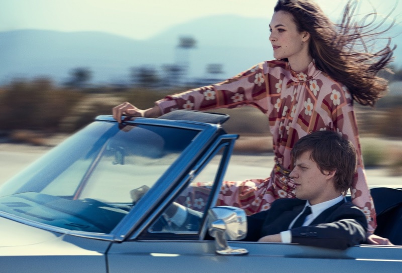 Posing in a convertible, Vittoria Ceretti models Prada dress