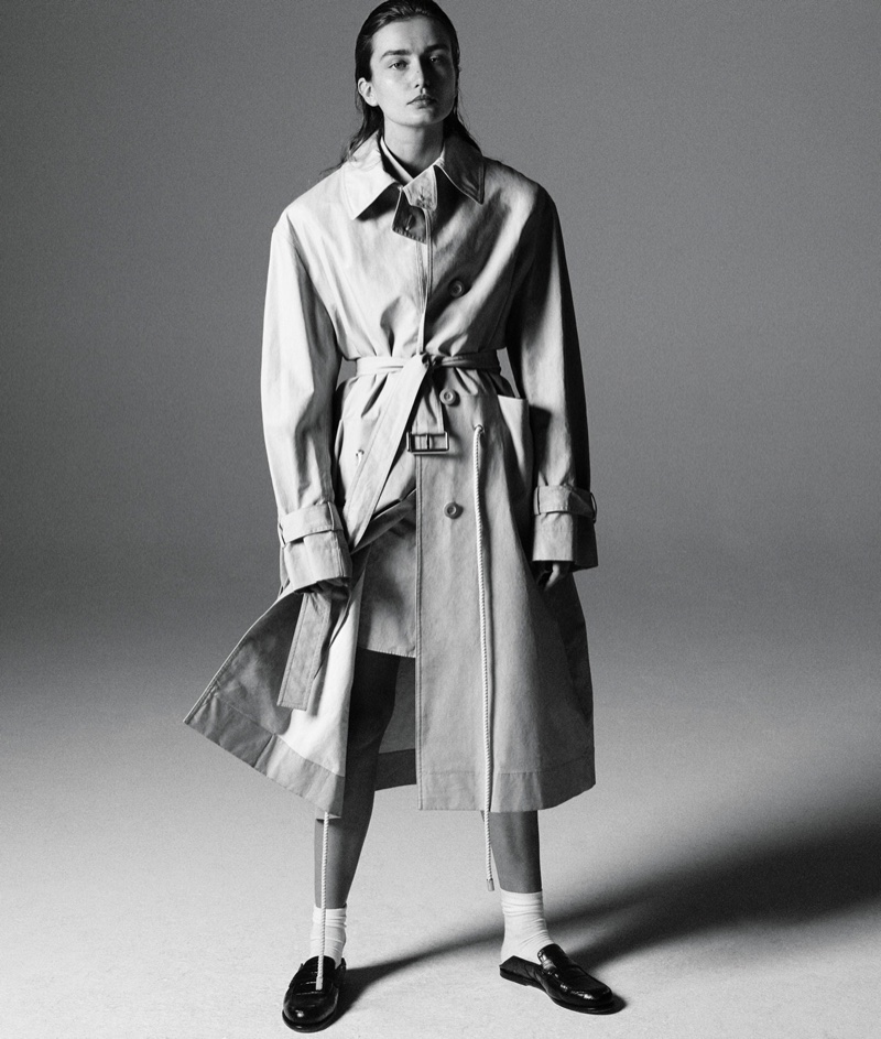Looking elegant, Andreea Diaconu wears Marni trench, Jil Sander shirt, Falke socks and Loewe loafers