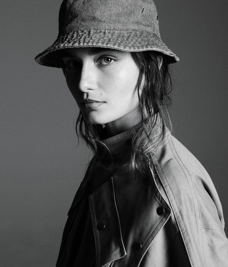Getting her closeup, Andreea Diaconu wears Kenzo dress and House of Lafayette hat