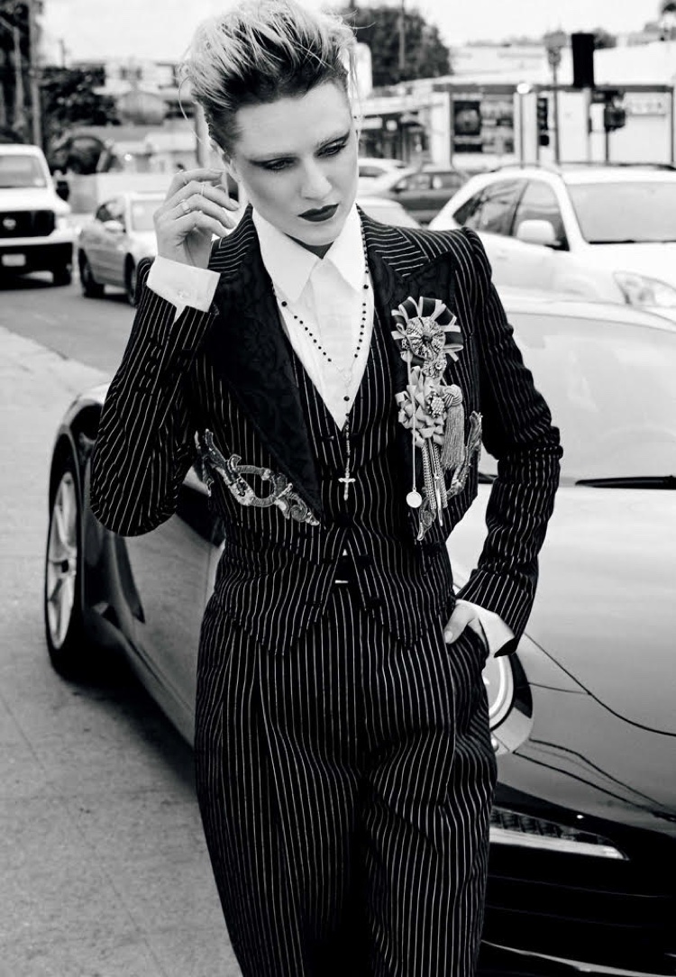 Embracing pinstripes, Evan Rachel Wood wears Dolce & Gabbana cotton suit and necklace with Gucci shirt
