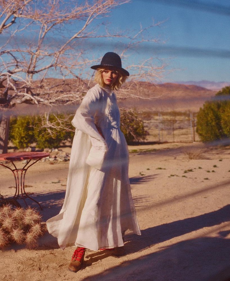 Layering up in white, Edita Vilkeviciute poses in Joseph dress (worn as jacket), Valentino maxi dress and Blugirl hat