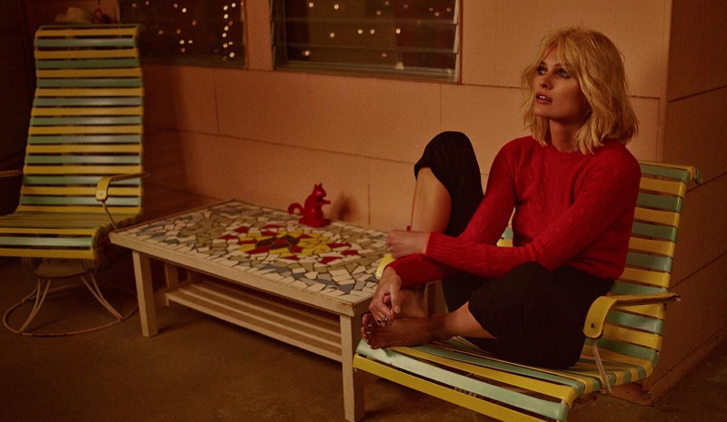 Chilling out, Edita Vilkeviciute models Polo Ralph Lauren sweater and Jacquemus pants