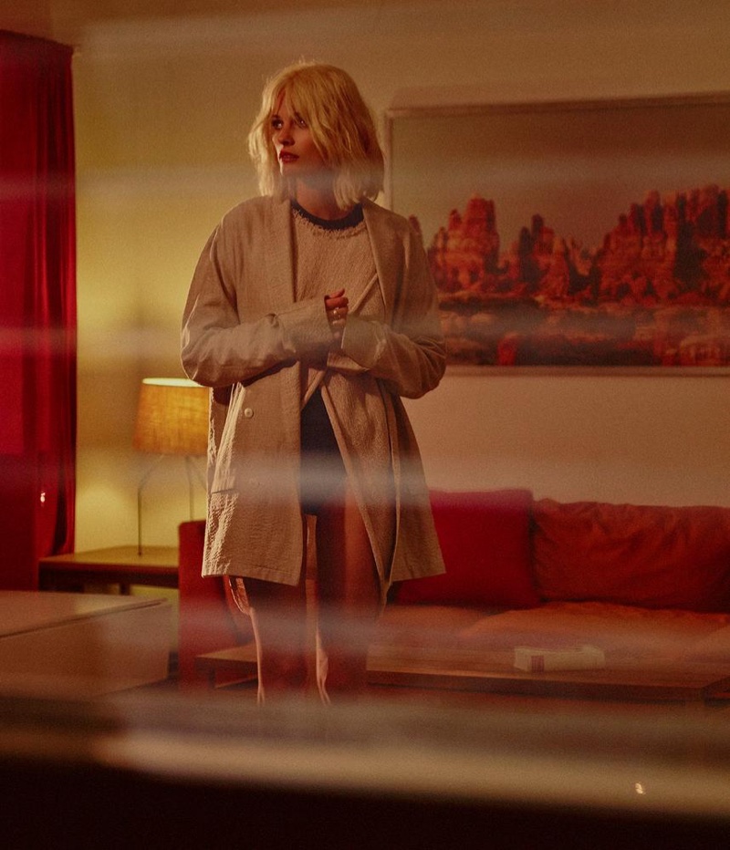 Model Edita Vilkeviciute wears Nehera jacket, Stella McCartney sweater, Ralph Lauren Collection sweater and Hanro of Switzerland brief