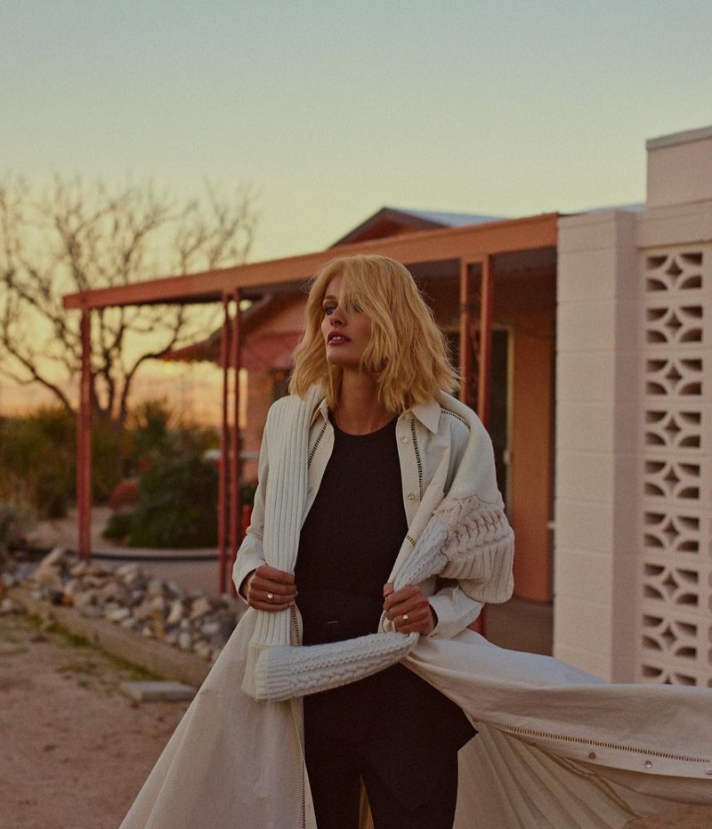 Edita Vilkeviciute sports Burberry sweater (on shoulders), Veronique Branquinho shirtdress, Ralph Lauren Collection sweater and pants