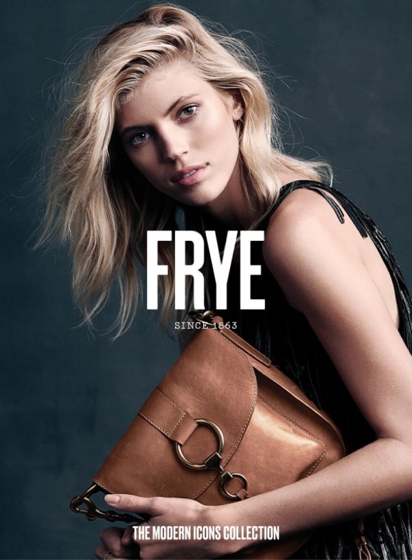 Model Devon Windsor poses with FRYE Ilana Saddle bag